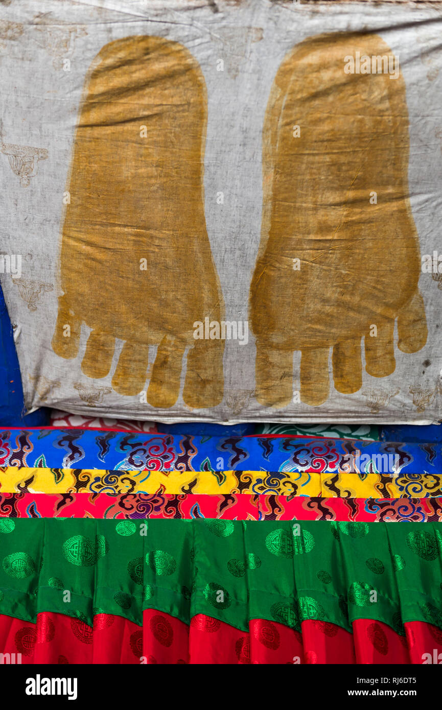Tibet, das Kloster Drepung, Füße von Buddha Stock Photo