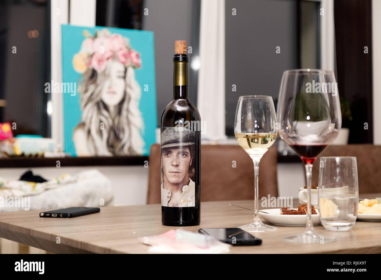 Russia Kemerovo 2019-01-19 Matsu El Picaro red Spanish wine from Toro stands on a wooden table against the window, beautiful pictures, glasses, snacks Stock Photo