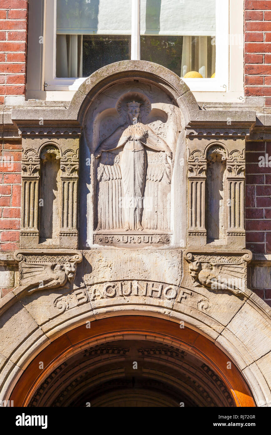 Niederlande, Amsterdam, Stadtzentrum, Eingang zum Beginenhof, Begijnhof, Wohnanlage Stock Photo