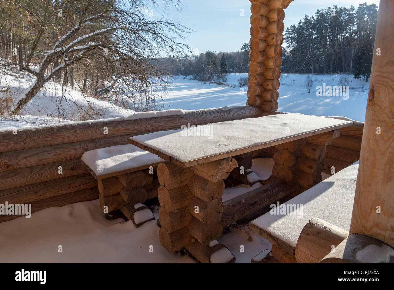 Fresh Pure Snow Covering Brown Mahogany Wood Color Painted Garden