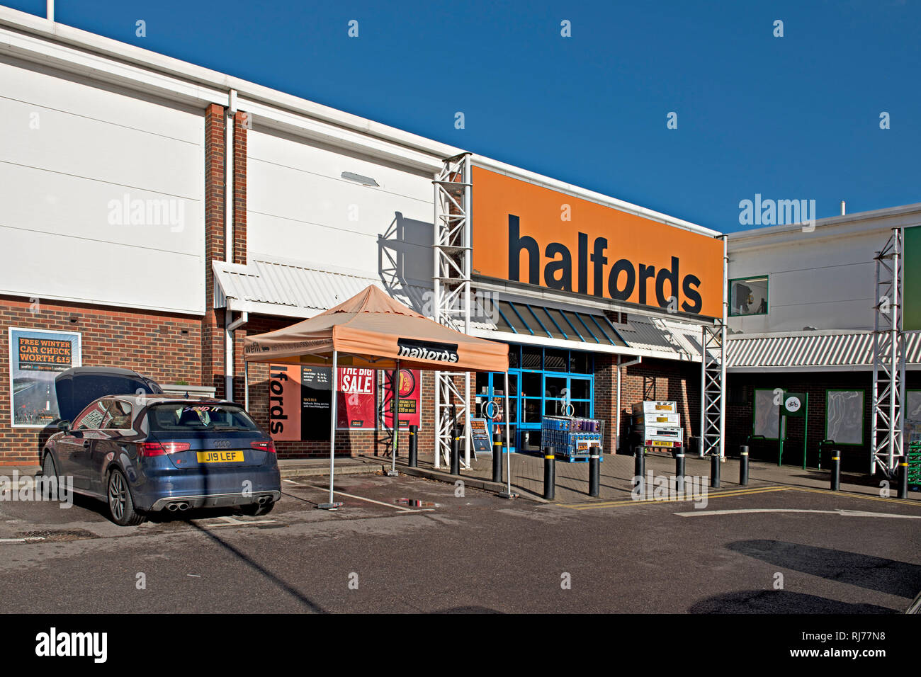 A Halfords store in Otford, Kent, selling autocare and cycling supplies Stock Photo