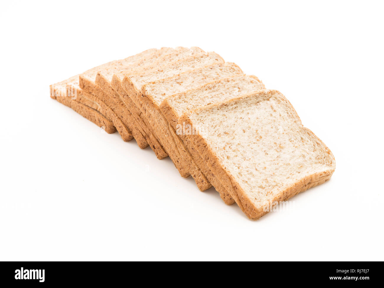 whole wheat bread on white background Stock Photo - Alamy