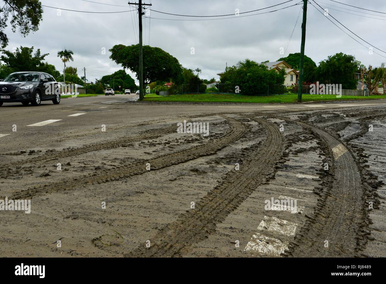 Tyres tracks in mud, Scenes from love lane as the Ross River recedes