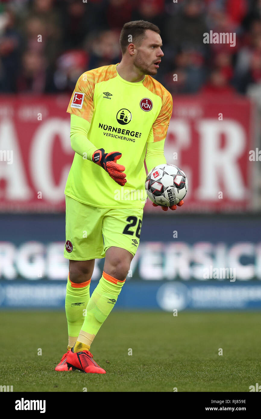 02 February 2019, Bavaria, Nürnberg: Soccer: Bundesliga, 1st FC Nuremberg - Werder Bremen, 20th matchday in Max Morlock Stadium. Nuremberg goalkeeper Christian Mathenia plays the ball. Photo: Daniel Karmann/dpa - IMPORTANT NOTE: In accordance with the requirements of the DFL Deutsche Fußball Liga or the DFB Deutscher Fußball-Bund, it is prohibited to use or have used photographs taken in the stadium and/or the match in the form of sequence images and/or video-like photo sequences. Stock Photo