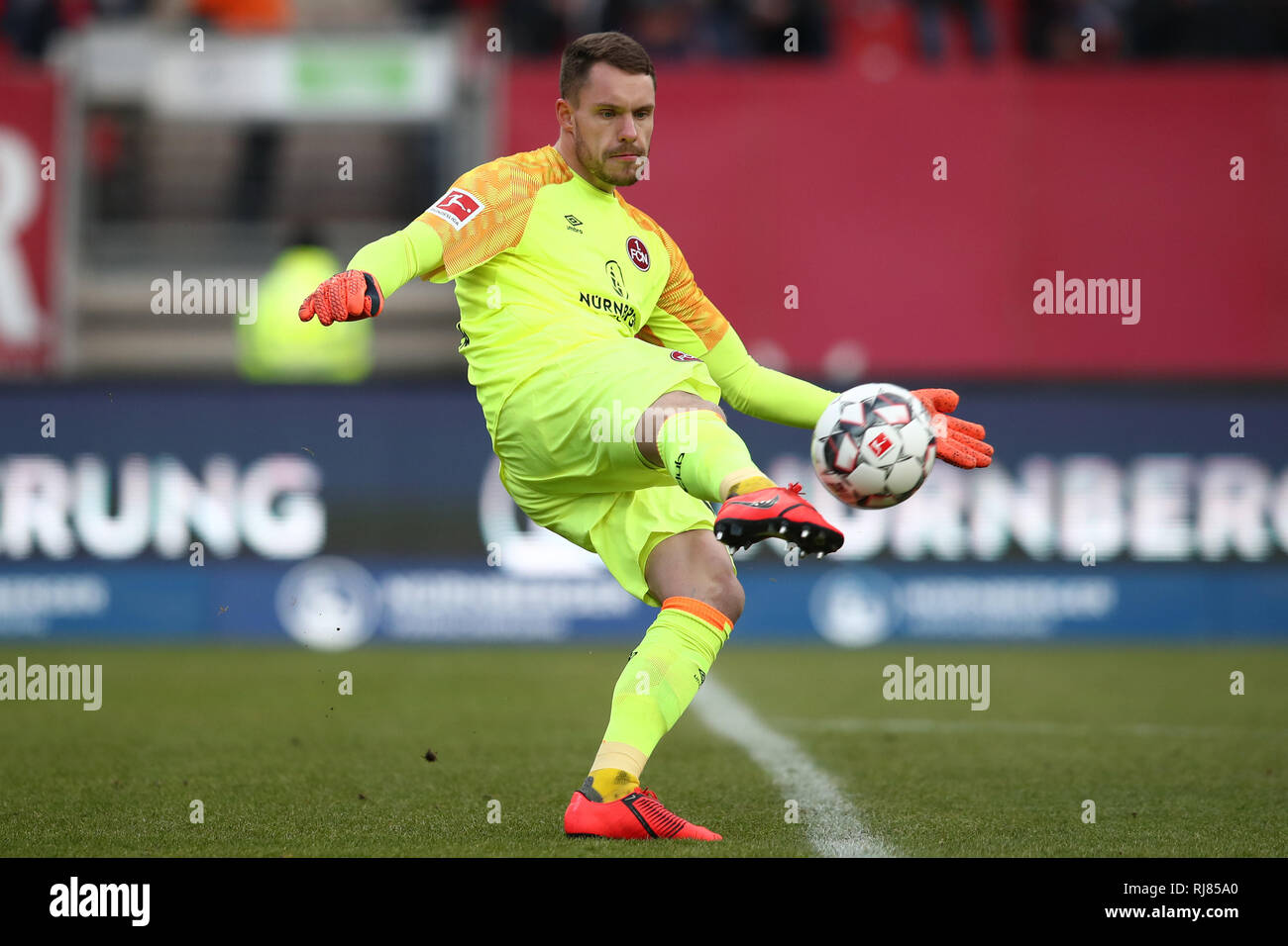 02 February 2019, Bavaria, Nürnberg: Soccer: Bundesliga, 1st FC Nuremberg - Werder Bremen, 20th matchday in Max Morlock Stadium. Nuremberg goalkeeper Christian Mathenia plays the ball. Photo: Daniel Karmann/dpa - IMPORTANT NOTE: In accordance with the requirements of the DFL Deutsche Fußball Liga or the DFB Deutscher Fußball-Bund, it is prohibited to use or have used photographs taken in the stadium and/or the match in the form of sequence images and/or video-like photo sequences. Stock Photo