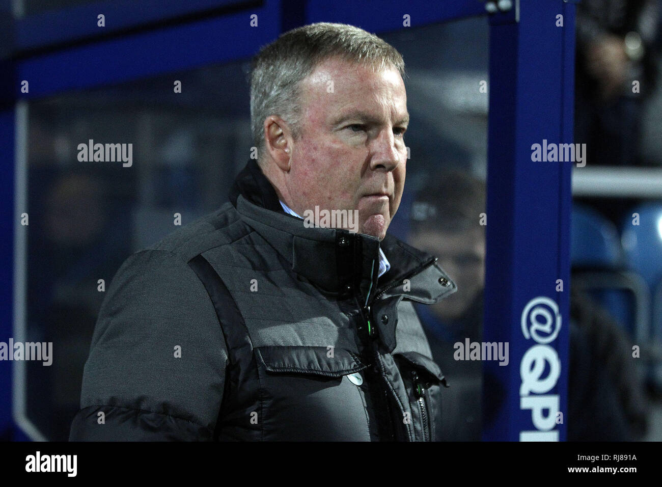 London, UK. 05th Feb, 2019. Portsmouth Manager Kenny Jackett looks on from the dugout. The Emirates FA Cup, 4th round replay match, Queens Park Rangers v Portsmouth at Loftus Road stadium in London on Tuesday 5th February 2019. this image may only be used for Editorial purposes. Editorial use only, license required for commercial use. No use in betting, games or a single club/league/player publications. pic by Steffan Bowen/Andrew Orchard sports photography/Alamy Live news Credit: Andrew Orchard sports photography/Alamy Live News Stock Photo