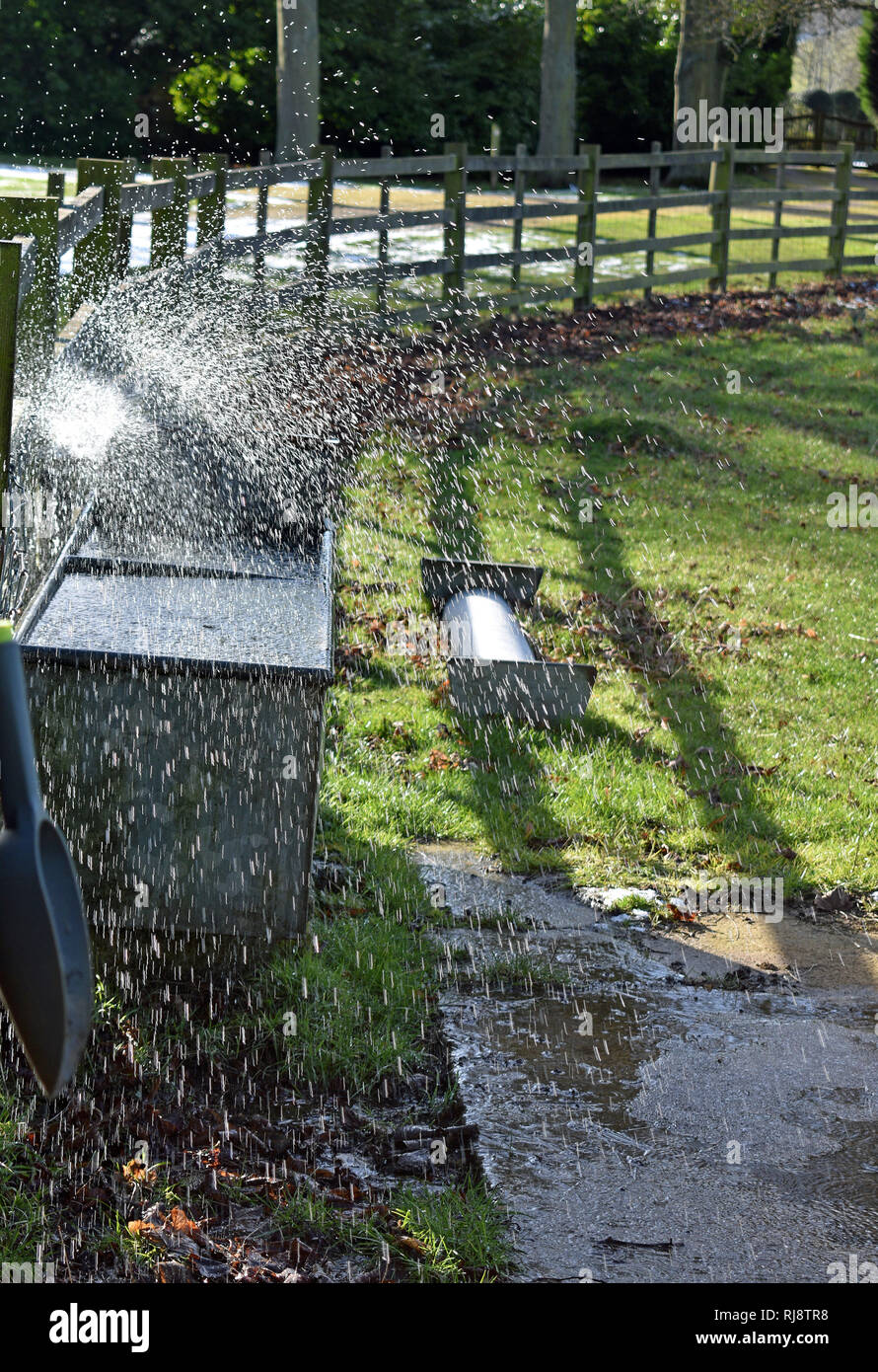 Burst pipe in water trough, Chipping Campden, Glos, Cotswolds, England