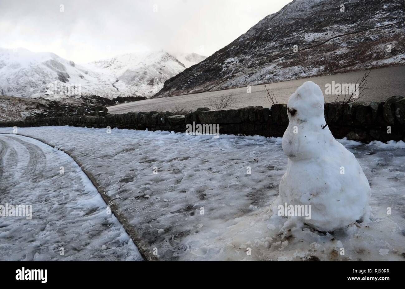 WEATHER - Snow and Ice on The A5 in the Ogwen Valley. Snowdonia  Dyffryn Ogwen coverd in snow  Snowman on the pass Tuesday 22nd January 2019. Stock Photo
