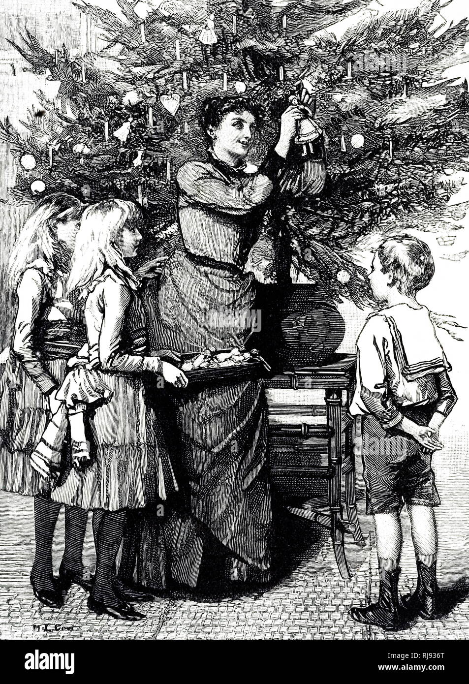 An engraving depicting a maid helping the children of the house to hang Christmas tree decorations. Dated 19th century Stock Photo