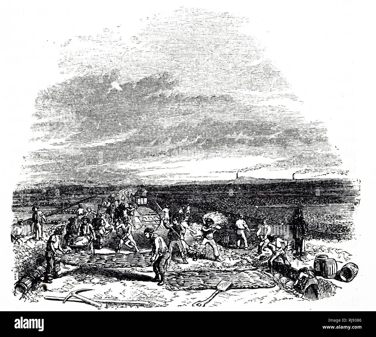An engraving depicting navvies working on the Liverpool-Manchester Railway across Chat Moss Bog. Dated 19th century Stock Photo