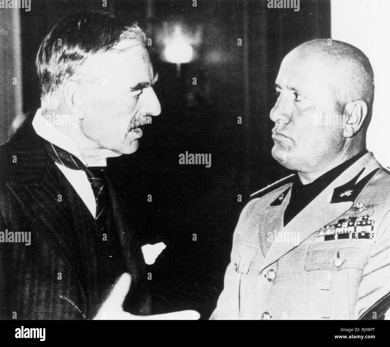 Mussolini With Chamberlain The Italian Dictator Talks To Neville Chamberlain The British Prime Minster During Their Visit To Munich In 1938 Stock Photo Alamy