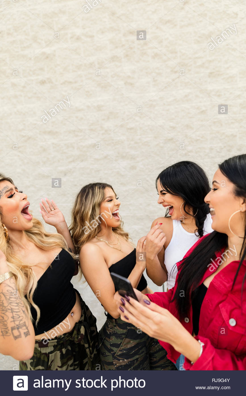 Laughing with a friend woman hi-res stock photography and images - Alamy
