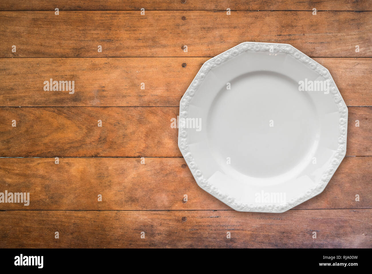 Plate On Wooden Table