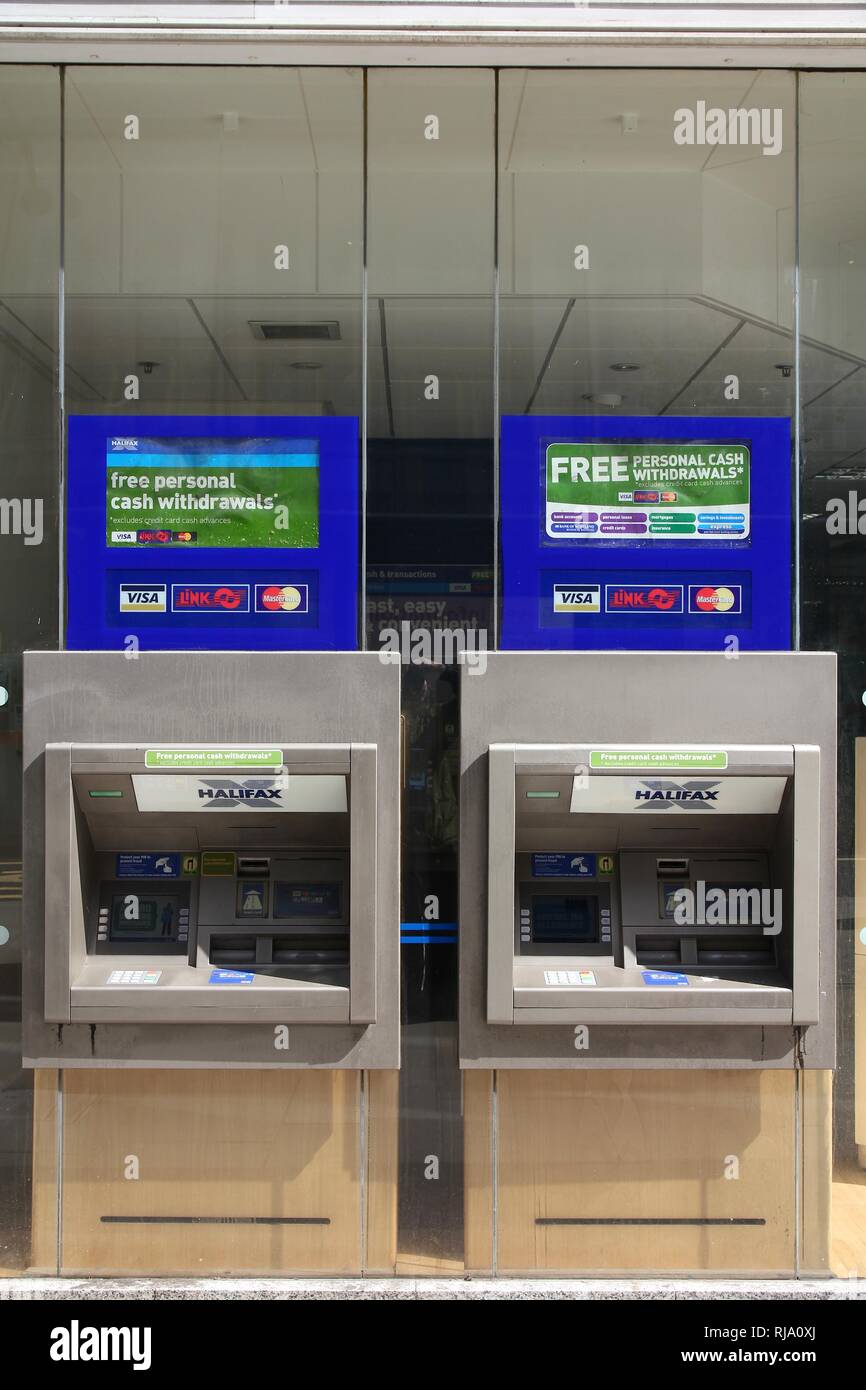 LONDON, UK - MAY 13, 2012: ATMs of Halifax Bank in London. Halifax is part of Lloyds Banking Group, one of largest banking corporations in Europe. Llo Stock Photo