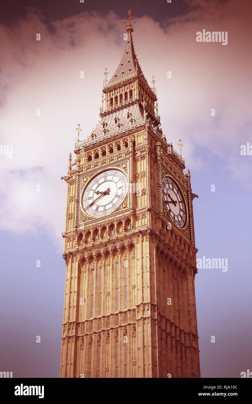 London, United Kingdom - Palace of Westminster (Houses of Parliament) Big Ben clock tower. UNESCO World Heritage Site. Cross processing color tone - f Stock Photo