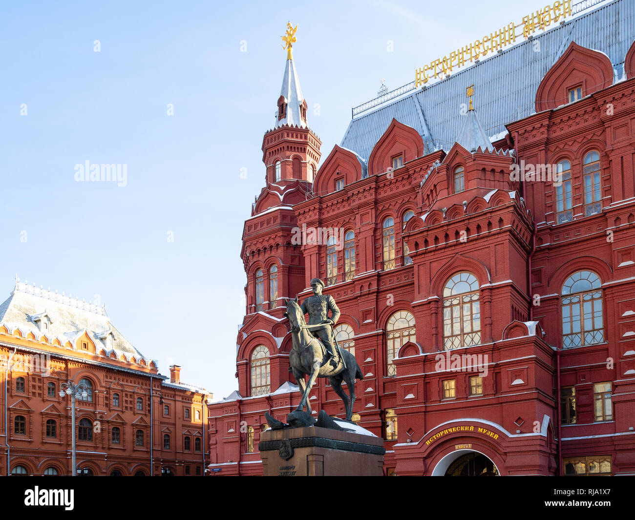 MOSCOW, RUSSIA - JANUARY 25, 2019: Monument of Soviet Commander Marshal Georgy Zhukov near State Historical Museum and former City Hall building at Ma Stock Photo