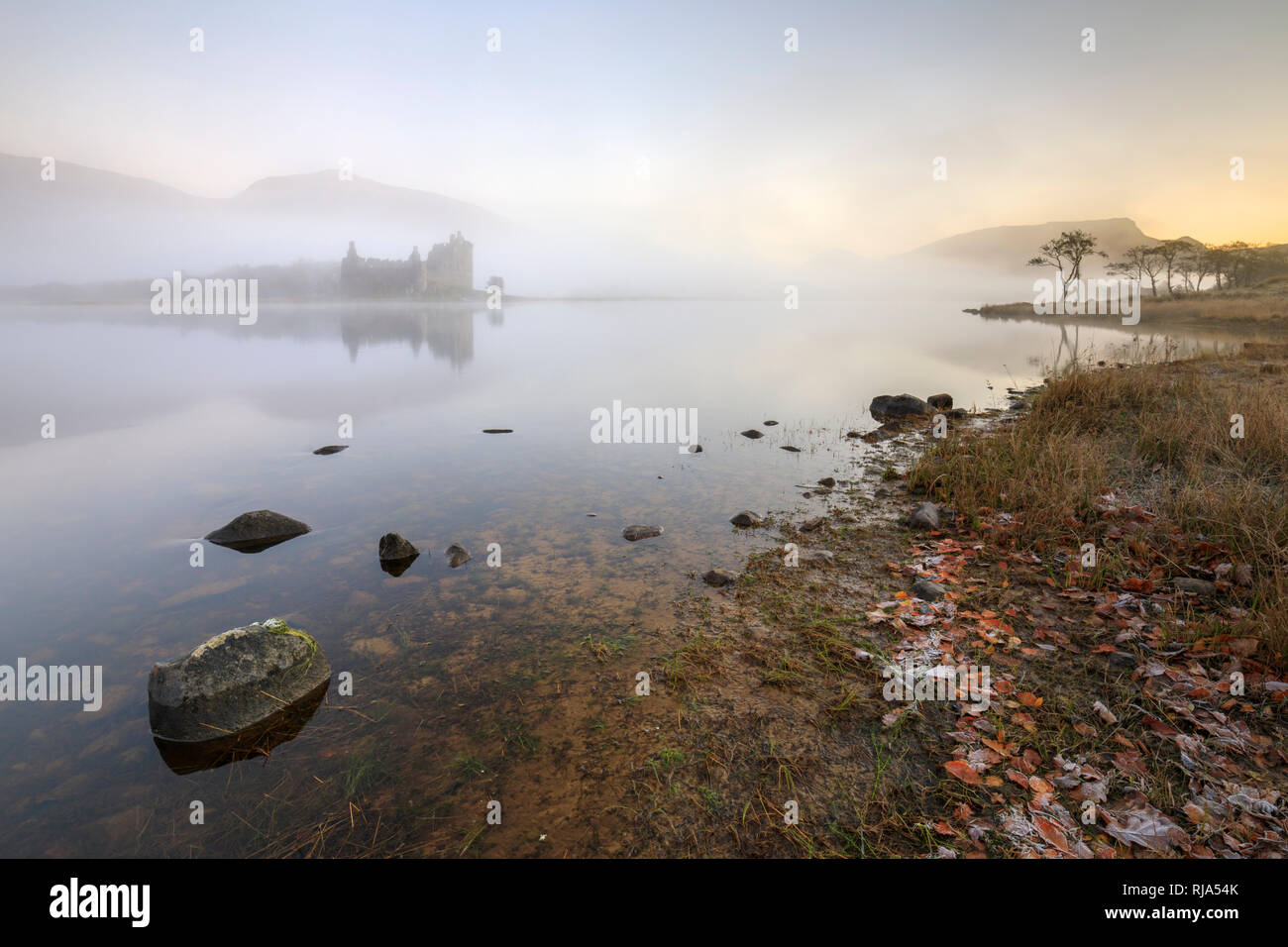 Kilchurn Castle on Loch Awe captured on a misty morning. Stock Photo