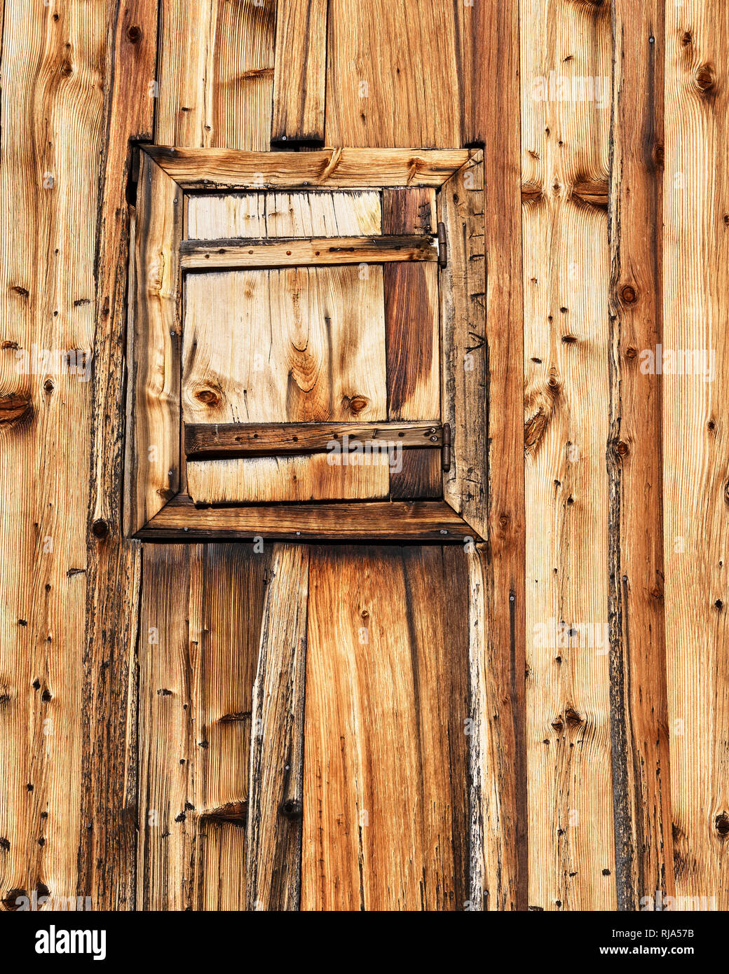 Wooden window shutter on one of the watermills in Valle dei Mulini, Longiaru, Dolomites, Alta Badia, South Tyrol, Italy Stock Photo