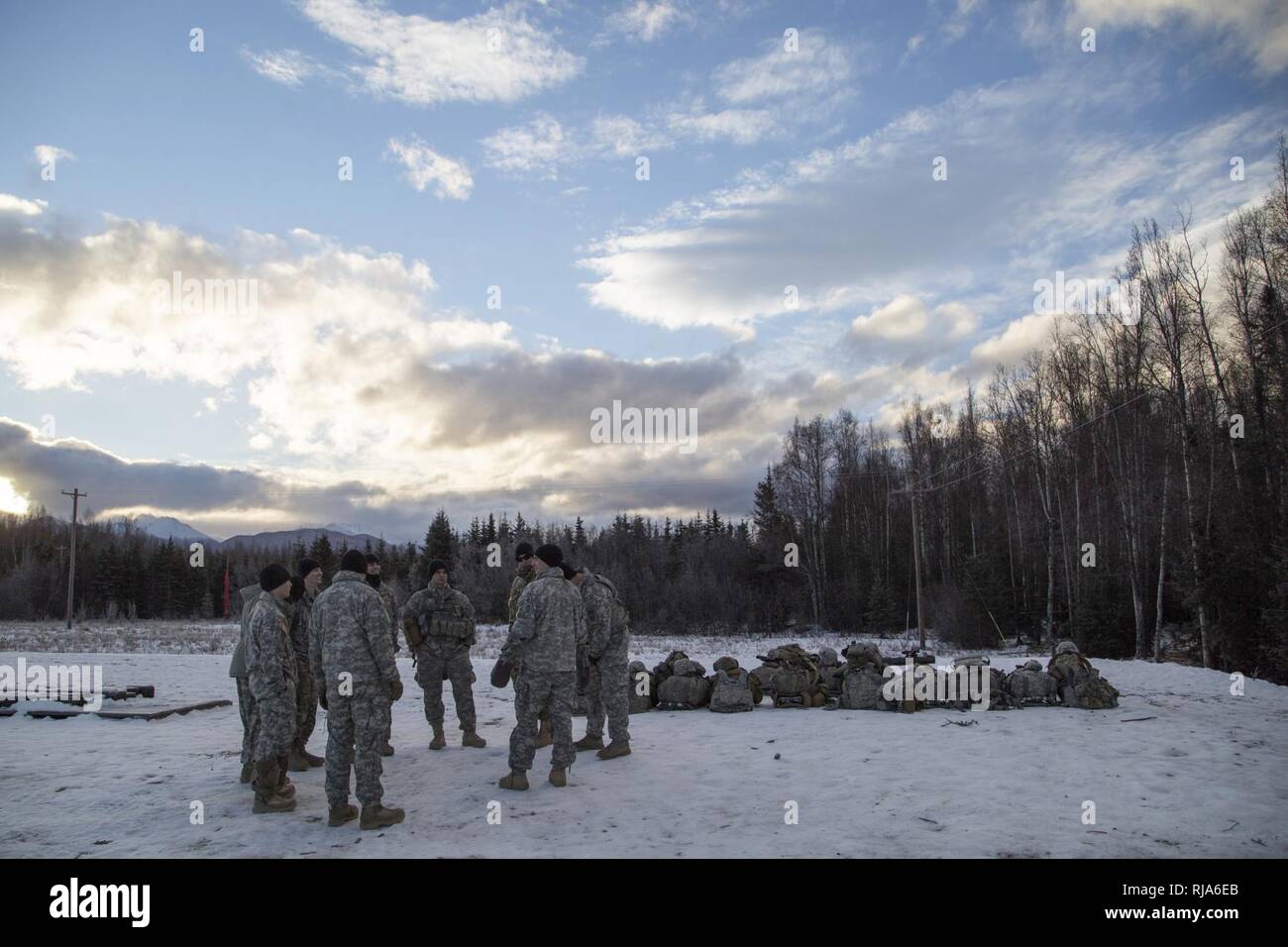 Paratroopers assigned to Baker Company, 3rd Battalion, 509th Parachute Infantry Regiment, 4th Infantry Brigade Combat Team (Airborne) 25th Infantry Division, U.S. Army Alaska, wait to conduct live fire training with the Carl Gustaf recoilless rifle system at Joint Base Elmendorf-Richardson, Alaska, Nov. 1, 2016. The Carl Gustaf is a man-portable, breach-loading, 84mm recoilless rifle capable of destroying armored targets from up to 700 meters away. Stock Photo