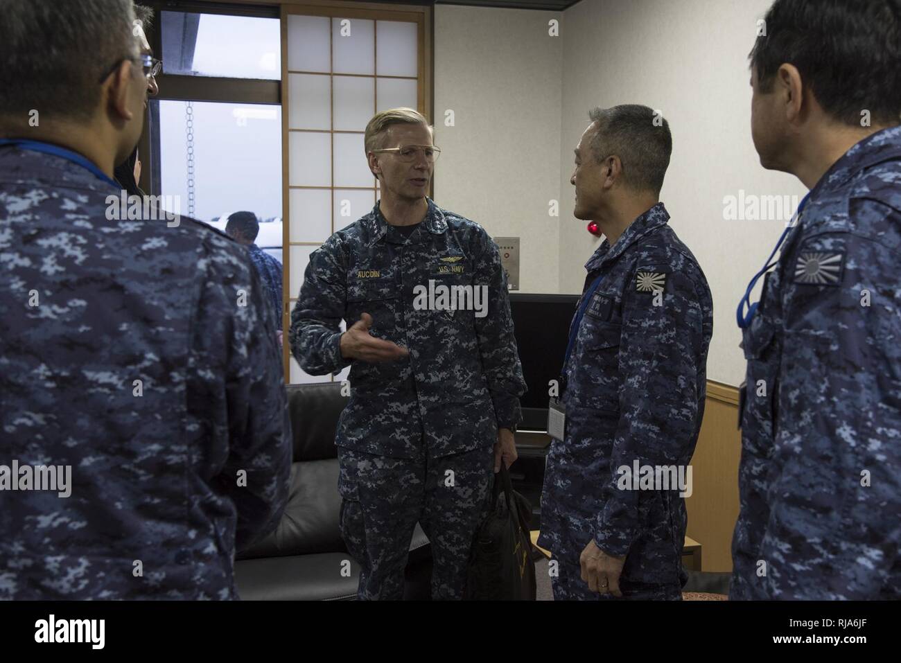ATSUGI, Japan (Nov.02, 2016) Vice Adm. Joseph P. Aucoin, Commander, U.S. 7th Fleet, speaks with Vice Adm. Yasuhiro Shigeoka, Commander-in-Chief, Self Defense Fleet, Japan Maritime Self-Defense Force, during a visit to Naval Air Facility Atsugi during exercise Keen Sword 2017 (KS 17). KS 17 is a joint, bilateral field-training exercise involving U.S. military and Japan Self-Defense Force personnel designed to increase the combat readiness and interoperability of the Japan-U.S. alliance. Stock Photo