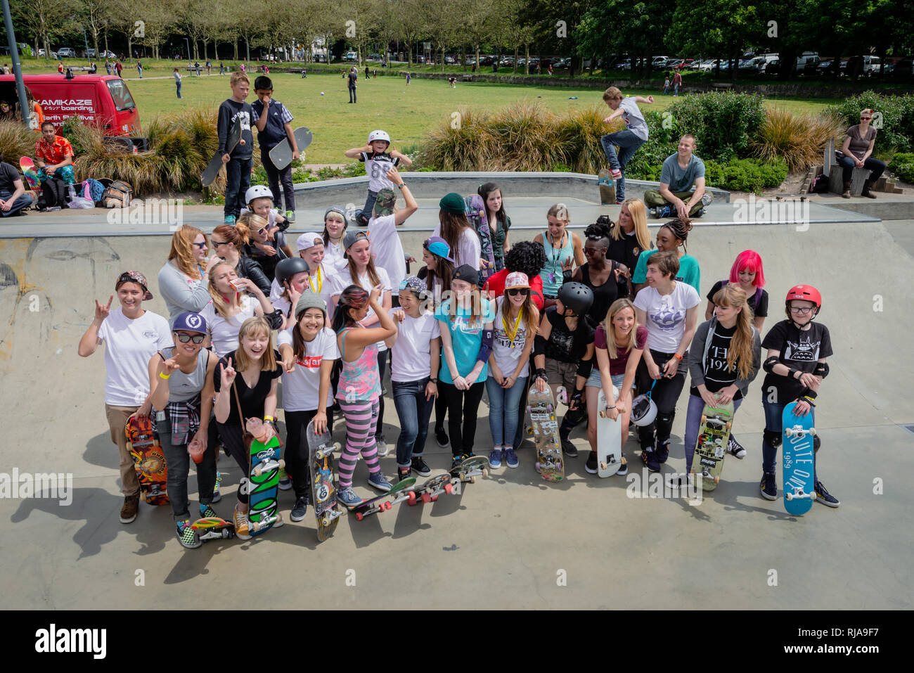 A group of female skaters posing for a photograph at The Level Skatepark in Brighton, East Sussex, England. Stock Photo