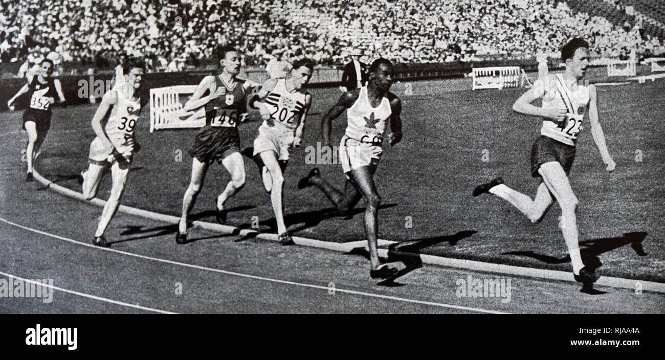 Photograph of Phil Edwards (1907-1971) in the 800 meter race in the 1932 Olympic games. Edwards competed in the 1932 Summer Olympics in Los Angeles and in the 1936 Summer Olympics in Berlin, where he was one of a number of black athletes, to compete before the Hitler regime. Phil's nickname was 'Man of Bronze' due to the amount of bronze medals he had won over his career. Stock Photo
