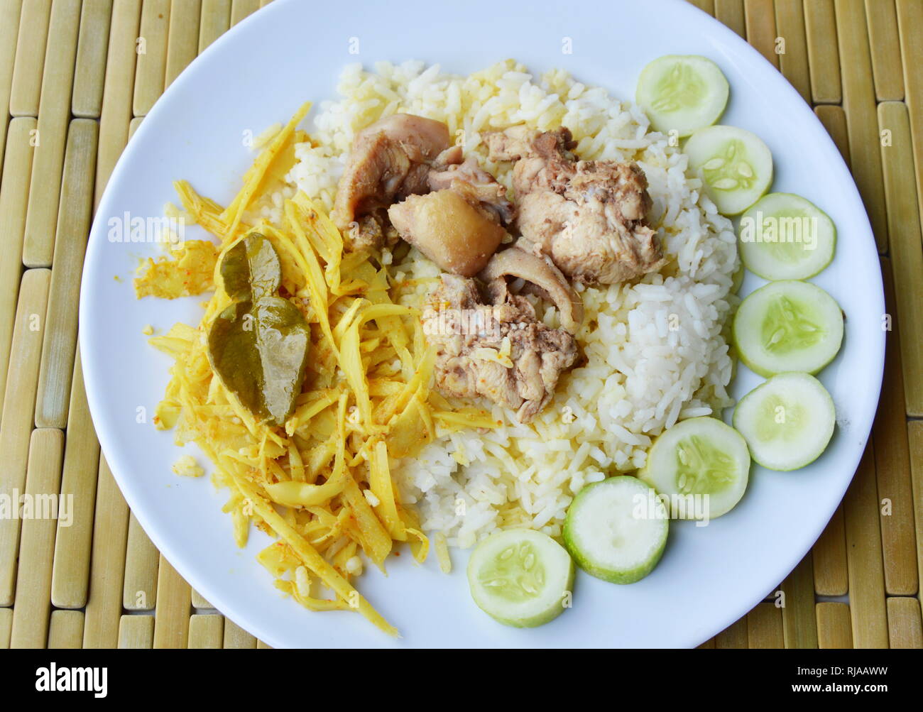 bamboo shoot curry and fried salty chicken on rice Stock Photo Alamy