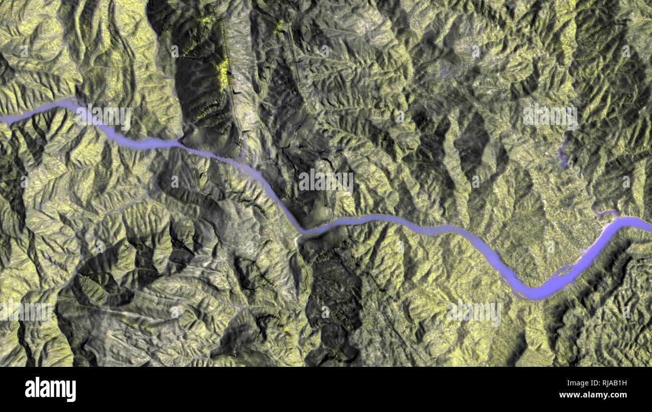 1987, Landsat-5 satellite photograph, of the Three Gorges Dam, China. The Three Gorges Dam is a hydroelectric gravity dam that spans the Yangtze River in Yichang, Hubei province, China. The Three Gorges Dam is the world's largest power station and was completed in 2012 Stock Photo