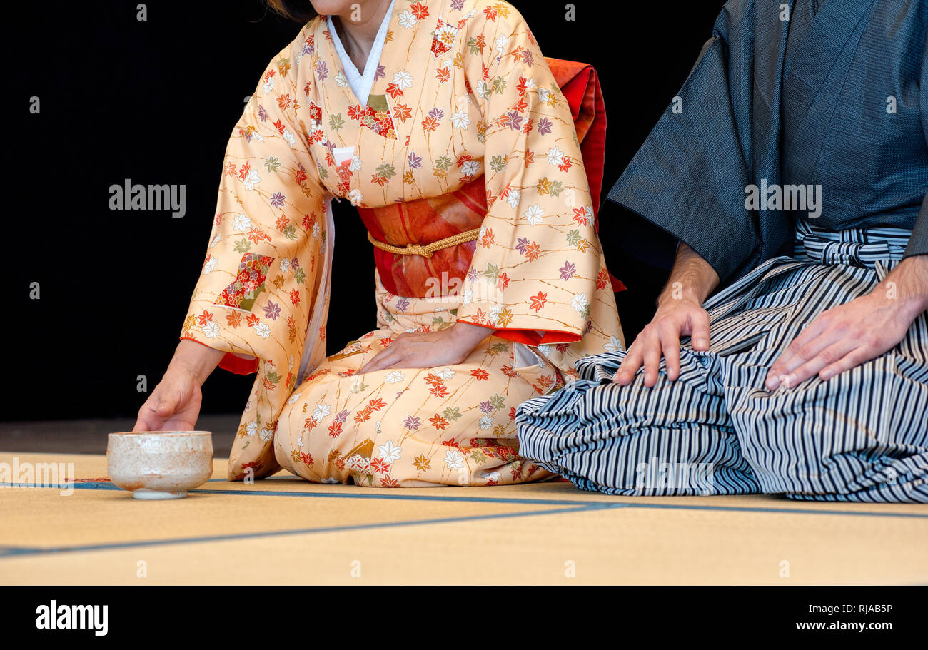 Man and woman during the tea ceremony Stock Photo