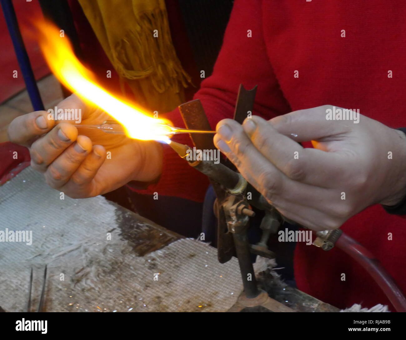 Glass making using traditional method and a gas flame; Egypt 2018 Stock Photo Alamy