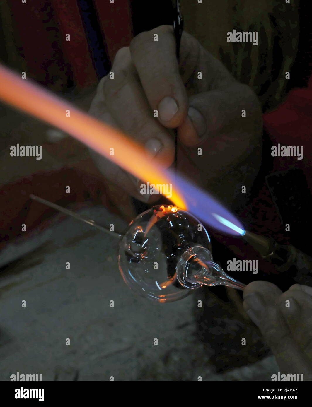 Glass making using traditional method and a gas flame; Egypt 2018 Stock Photo Alamy