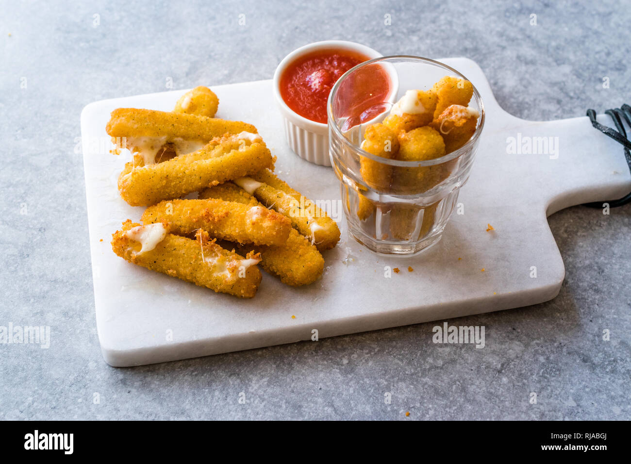Breaded Fried Mozzarella Cheese Sticks with Ketchup Dipping Sauce