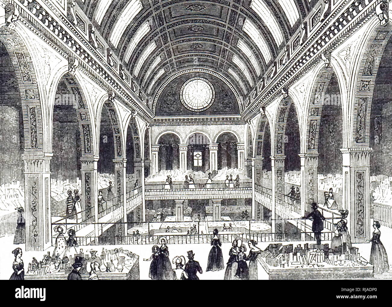 An engraving depicting a Bazar on Oxford Street, London. The first floor was a picture gallery. The next level shown had counters for millinery, lace, hosiery, cutlery, jewellery, toys, children's clothing, etc.. Each stand had a young assistant. Dated 19th century Stock Photo