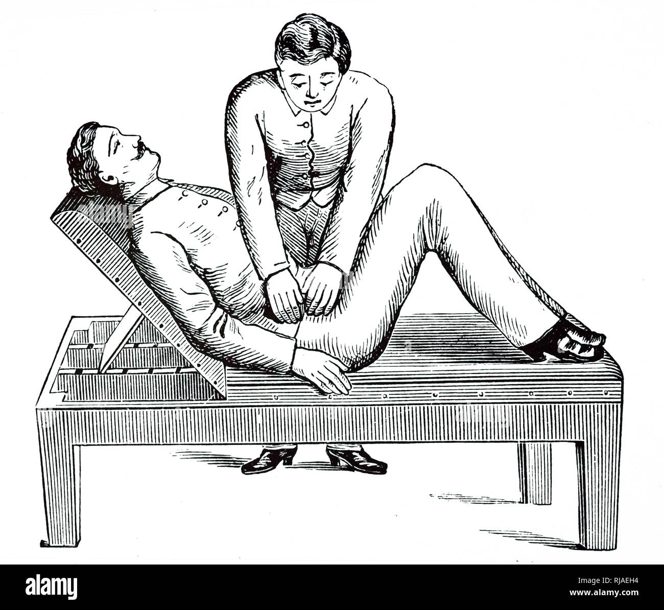 An engraving depicting a patient in a half-hook position having a colon massage recommended for constipation. Dated 19th century Stock Photo