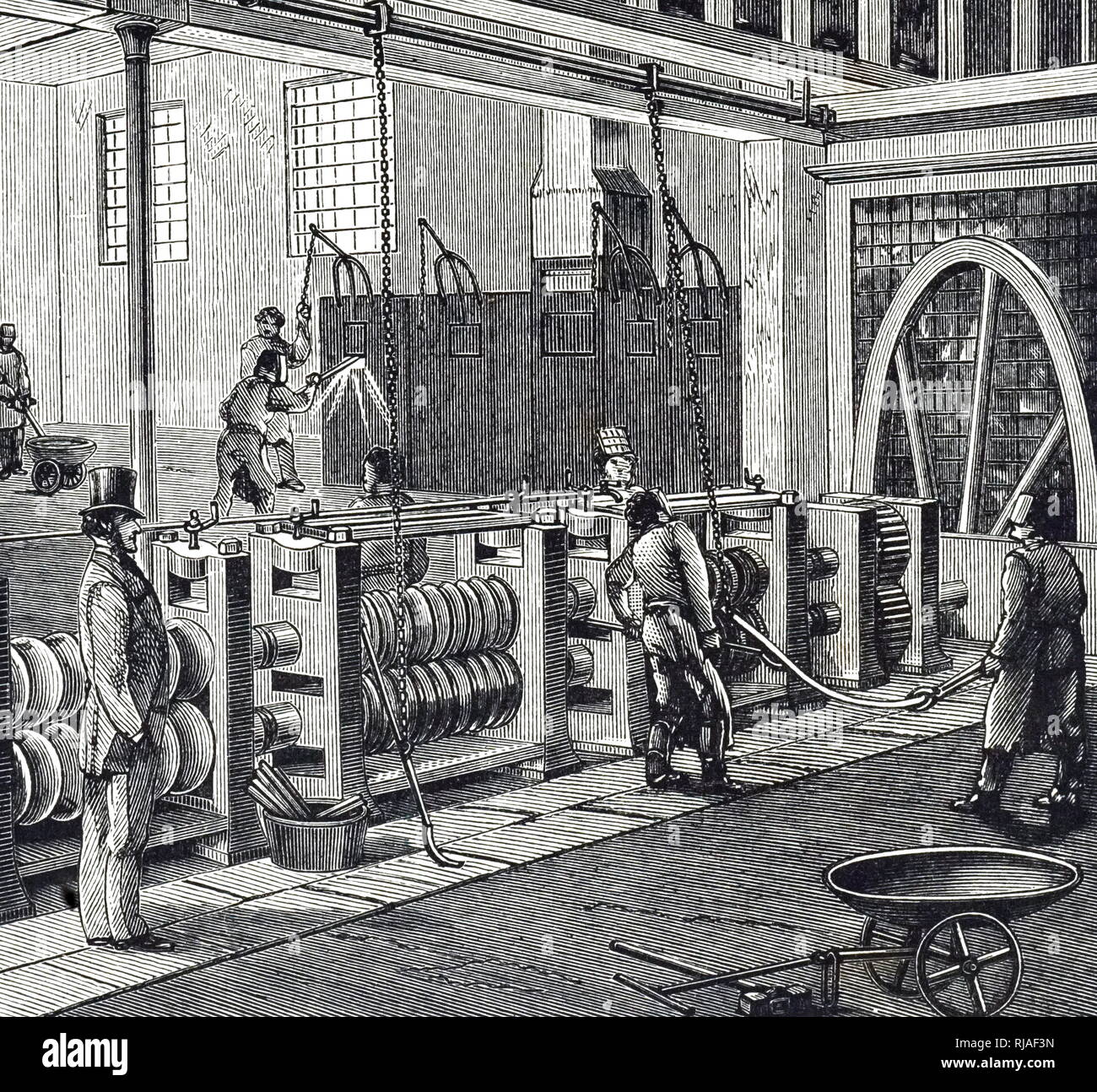 An engraving depicting the process of making wrought iron: rolling blooms into bars - Dowlais Ironworks, an ironworks and steelworks located at Dowlais near Merthyr Tydfil, in Wales. Dated 19th century Stock Photo