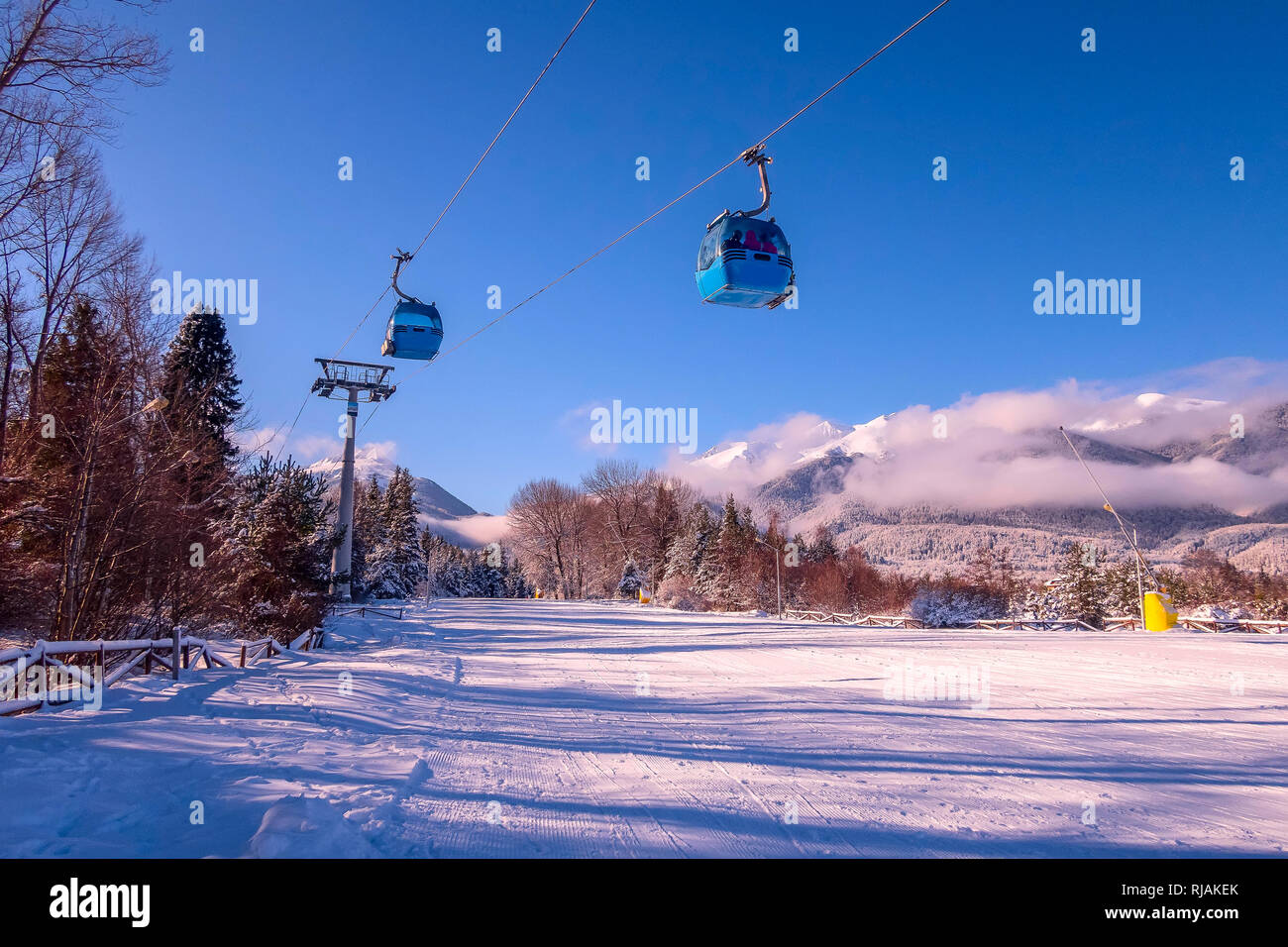 Ski Resort Sunset Or Sunrise Panorama With Gondola Ski Lift Cabin