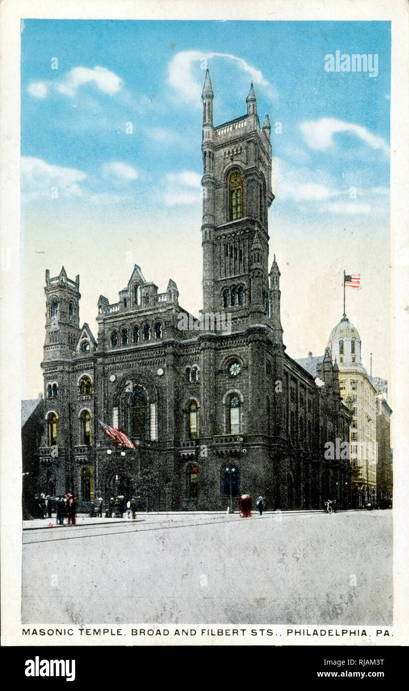 postcard depicting the Masonic Temple in Philadelphia USA. Located at 1 North Broad Street, directly across from Philadelphia City Hall, it serves as the headquarters of the Grand Lodge of Pennsylvania, Free and Accepted Masons. The Temple was designed in the medieval Norman style by James H. Windrim, and completed in 1902 Stock Photo