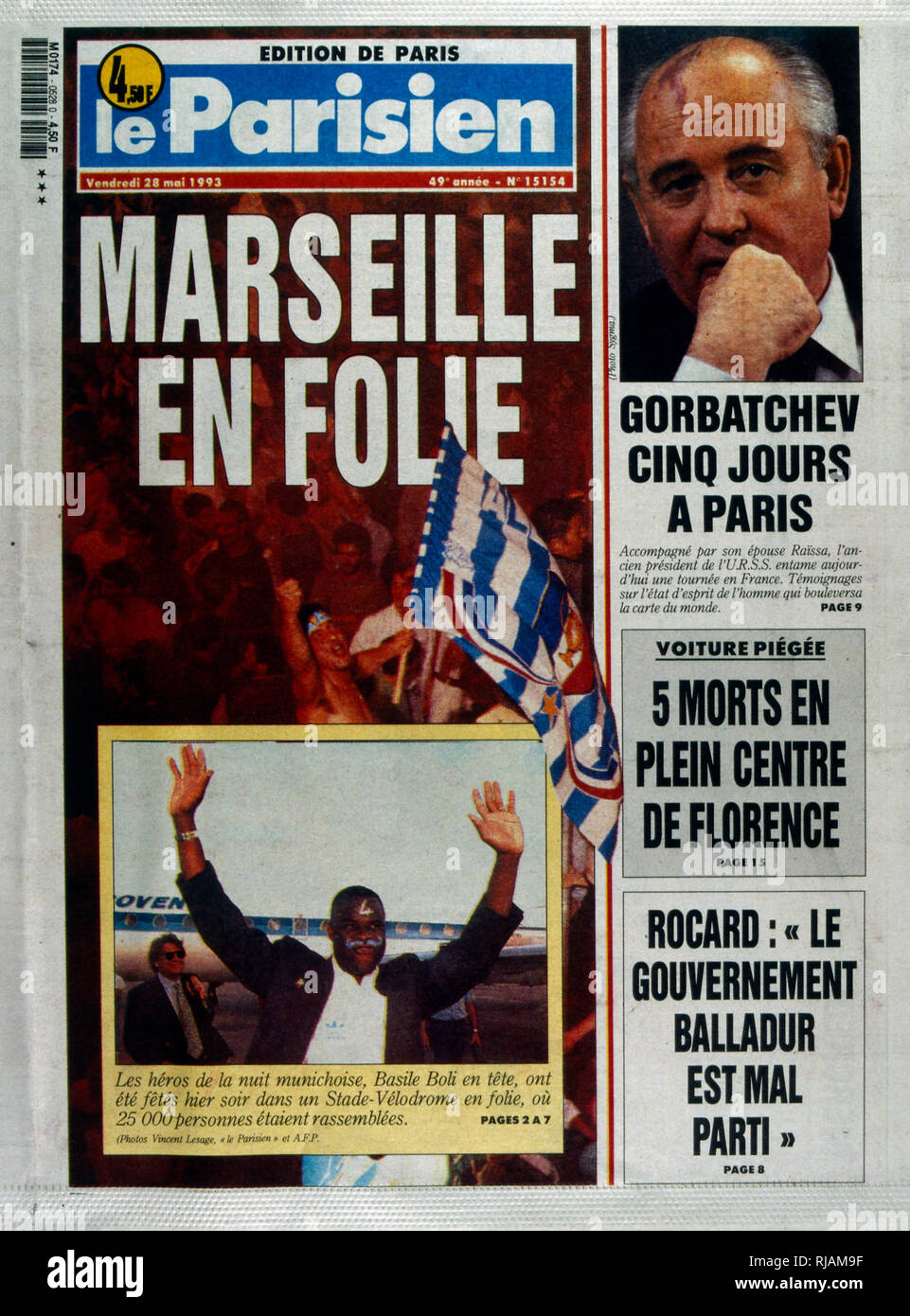 French publication 'Le Parisien' reporting the Marseilles Football club winning the UEFA Champions League in 1993. The highlight of the Marseilles football club's history was winning the new format UEFA Champions League in 1993. Basile Boli scored the only goal against Italy's Milan in the final held in Munich's Olympic Stadium. This triumph, however, was followed by a decade of decline. In 1994, due to financial irregularities and a match fixing scandal involving then president Bernard Tapie Stock Photo