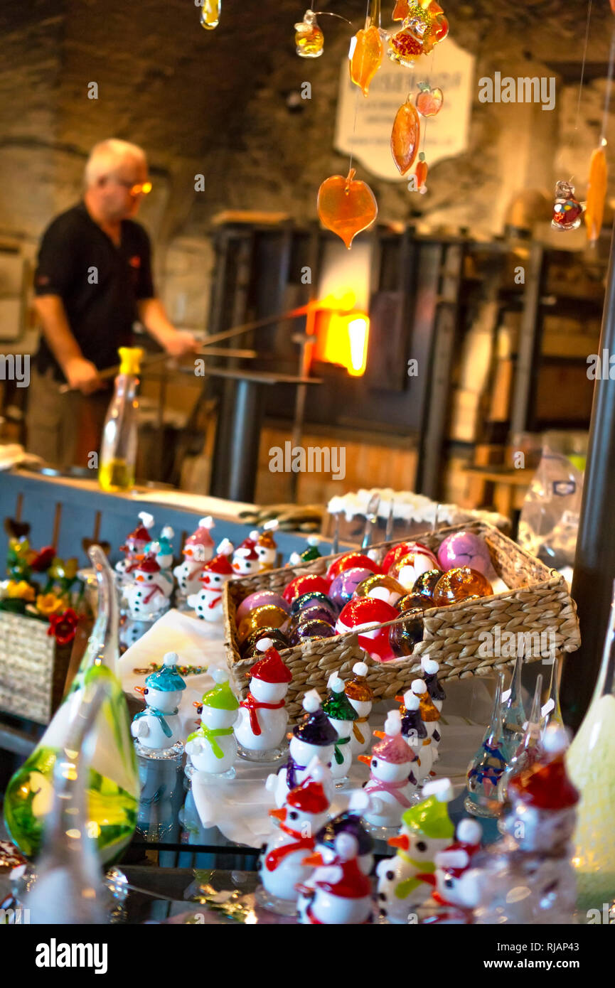 Glass worker glassware at glass factory workhouse in Austria