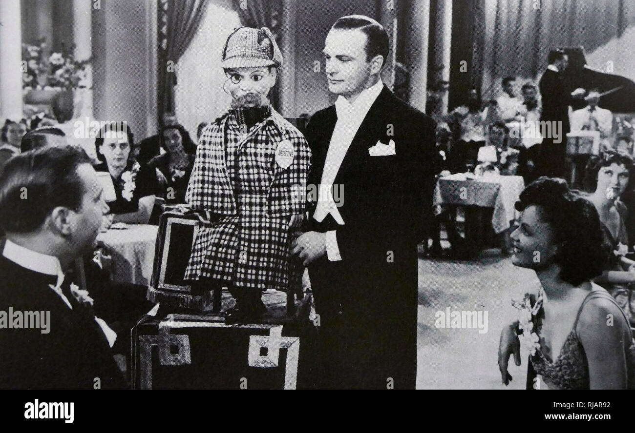1939 film 'Charlie McCarthy, Detective' starring Edgar John Bergen (1903 – 1978), an American actor, comedian and radio performer, best known for his proficiency in ventriloquism and his character Charlie McCarthy Stock Photo