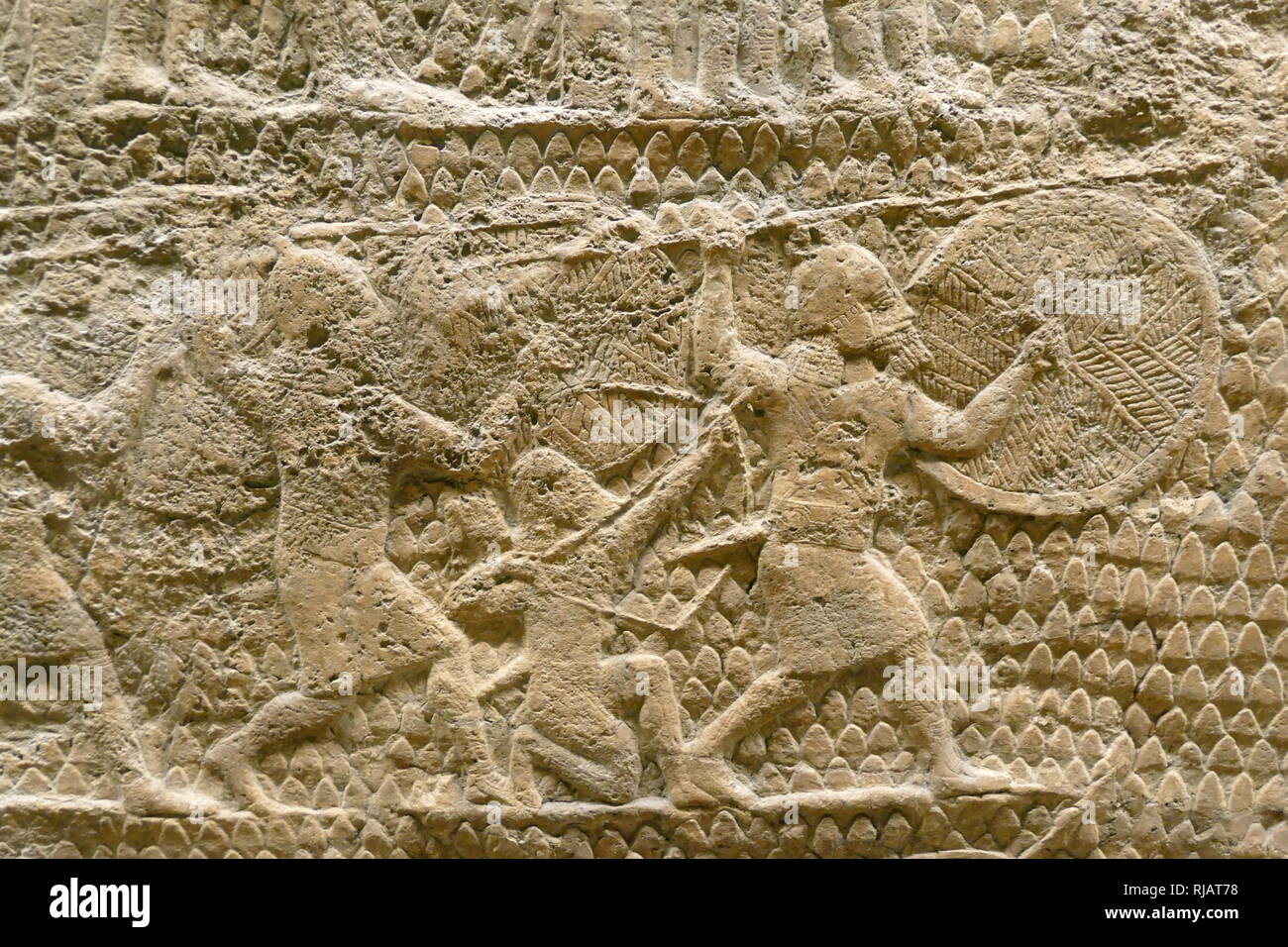 Stone carved relief depicting an attack on Lachish. Assyrian, about 700-692 ВС. From Nineveh, South-West Palace, This panel, show an important incident during Sennacherib's campaign of 701 BC, the capture of Lachish in the kingdom of Judah. Stock Photo