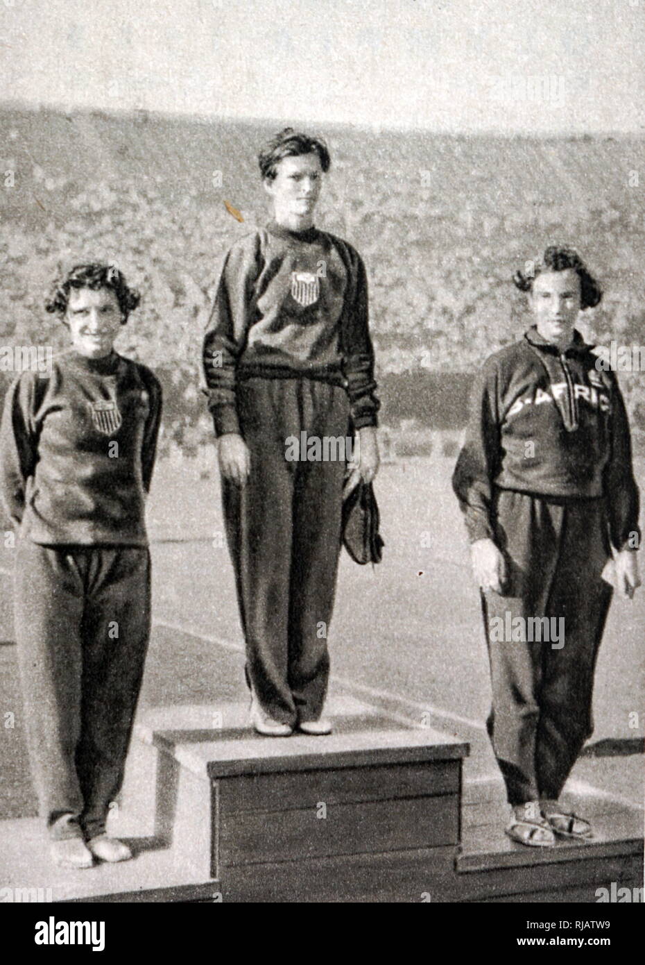 80m Hurdles podium at the 1932 Olympic games.  Mildred Ella 'Babe' Didrikson Zaharias (1911 - 1956) took gold for the USA. Evelyne Ruth Hall (1909 - 1993) took silver for the USA. Marjorie Rees Clark (1909 - 1993) took bronze for South Africa. Stock Photo