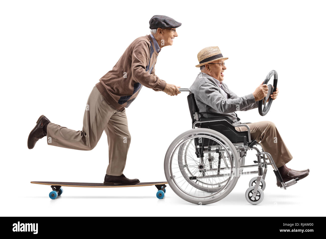 Full length profile shot of an elderly man riding a longboard and pushing a man holding a steering wheel and sitting in a wheelchair isolated on white Stock Photo