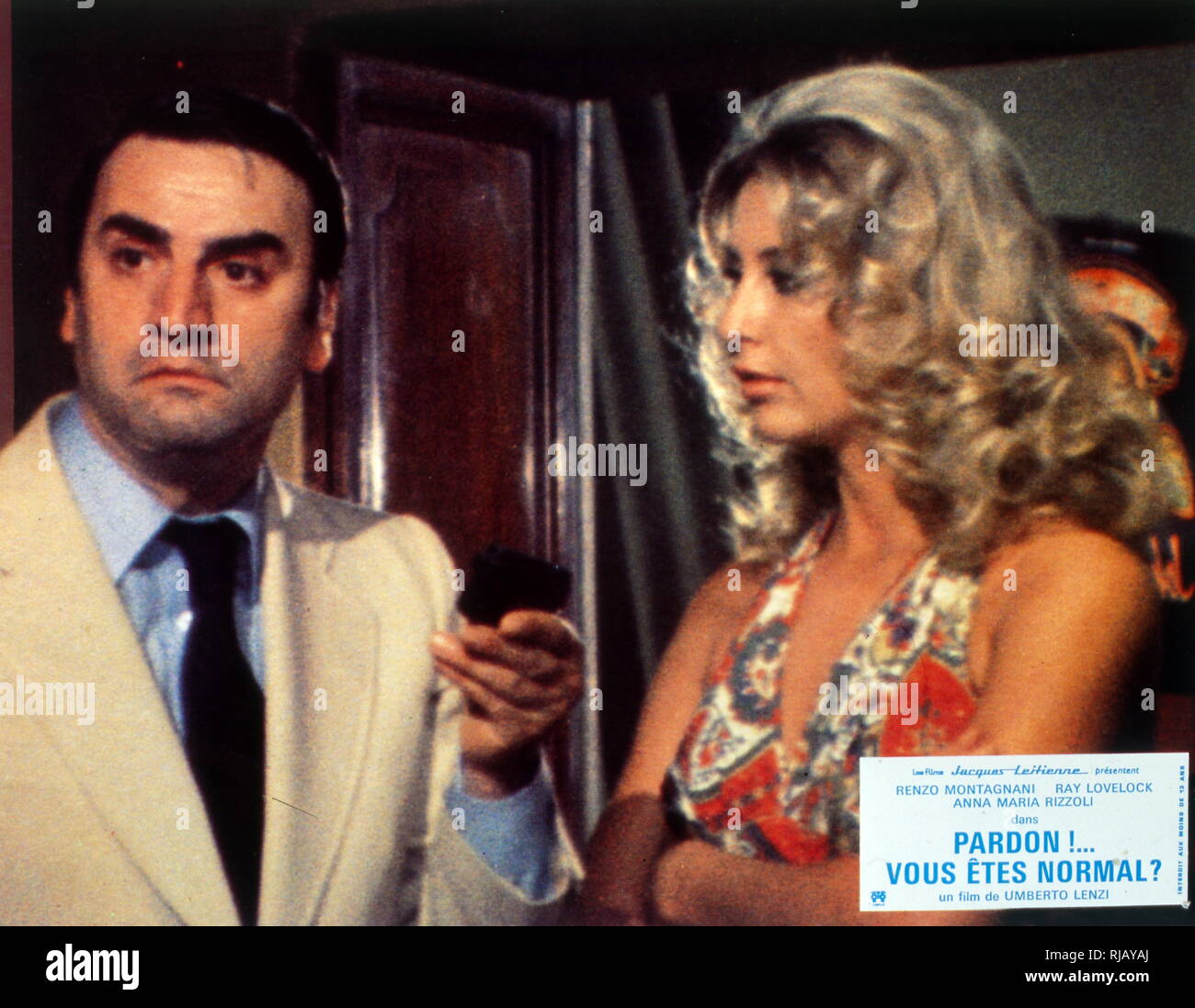 Pardon!...Vous etes normal? Scusi lei e normale? (Pardon Me, Are You Normal?); 1979 Italian comedy film, directed by Umberto Lenzi and starring Renzo Montagnani, Ray Lovelock and Anna Maria Rizzoli. Stock Photo