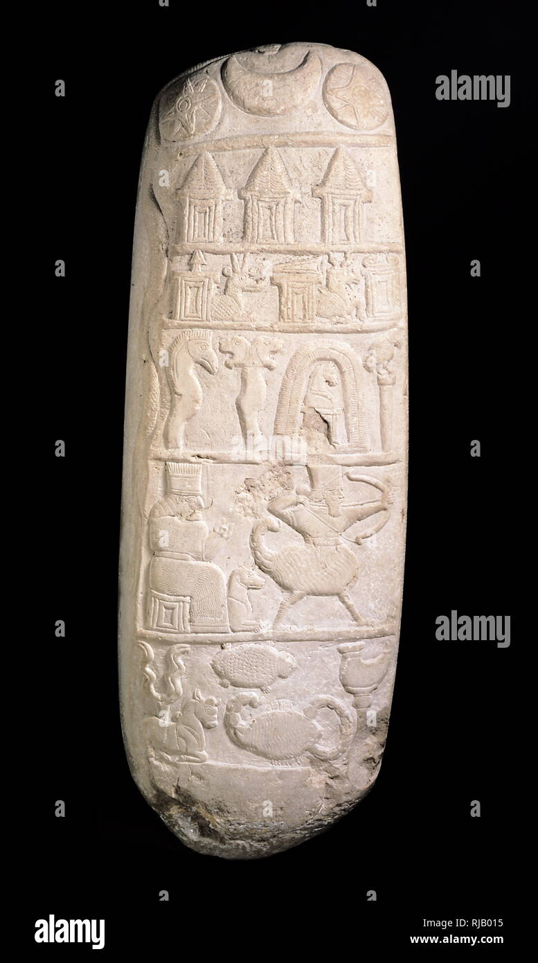 Nebuchadnezzar granting Marduk freedom from taxation depicted on a white limestone boundary stone circa 1104 BC. Nebuchadnezzar I (1124-1103 BCE) fourth king of the Second Dynasty of Isin and Fourth Dynasty of Babylon. He ruled for 22 years according to the Babylonian King List C,[i 2] and was the most prominent monarch of this dynasty. He is best known for his victory over Elam and the recovery of the cultic idol of Marduk. Stock Photo