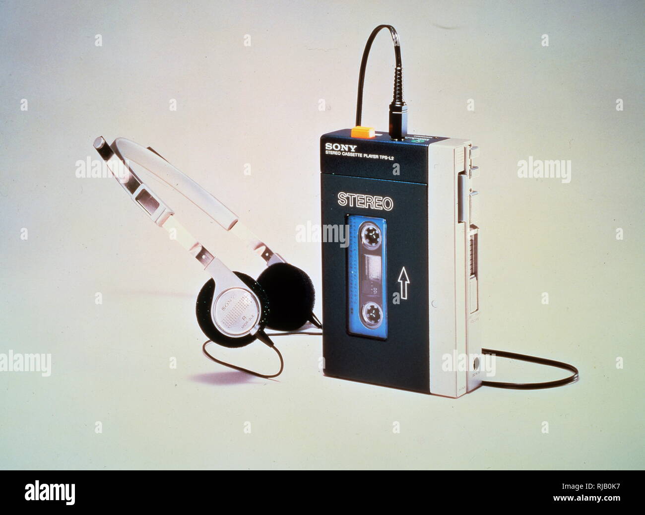British model of the Sony stereo cassette player TPS-L2; the first low-cost portable stereo, launched July 1, 1979. In June 1980, it was introduced in the U.S. In the UK, it came with stereo playback and two mini headphone jacks, permitting two people to listen at the same time. The TPS-L2 was created by Akio Morita, Masaru Ibuka (the co-founders of SONY) and Kozo Ohsone. Stock Photo