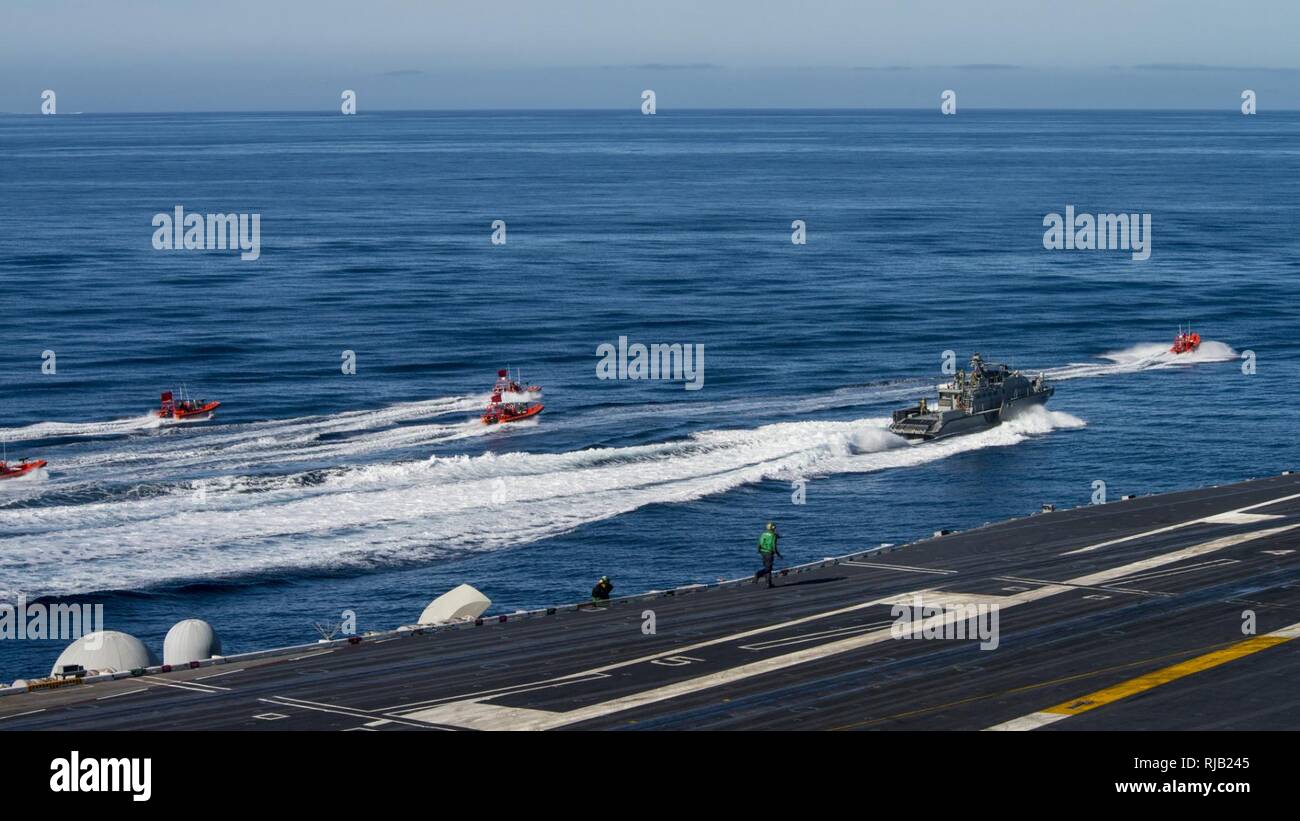 PACIFIC OCEAN (Nov. 4, 2016) A Coastal Riverine Squadron Group One (CRG-1) Mark VI Patrol Boat patrols the waters near the Carl Vinson Strike Group as it conducts a simulated strait transit. Carl Vinson is currently underway conducting Composite Training Unit Exercise (COMPTUEX) in preperation for an upcoming deployment. Stock Photo