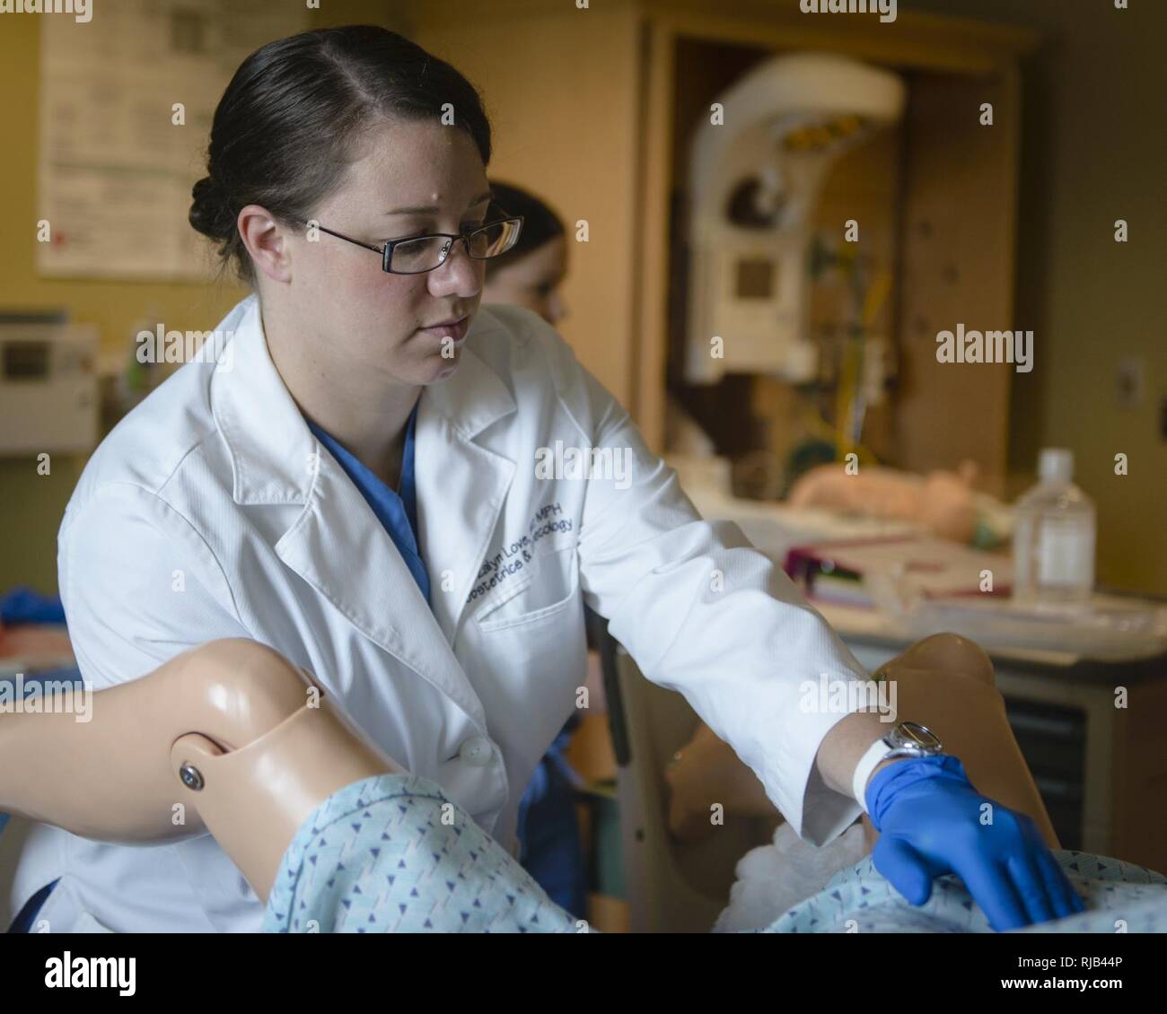 U.S. Navy Lt. Cmdr. Rozalyn Love, an obstetrics and gynaecology (OB/GYN ...