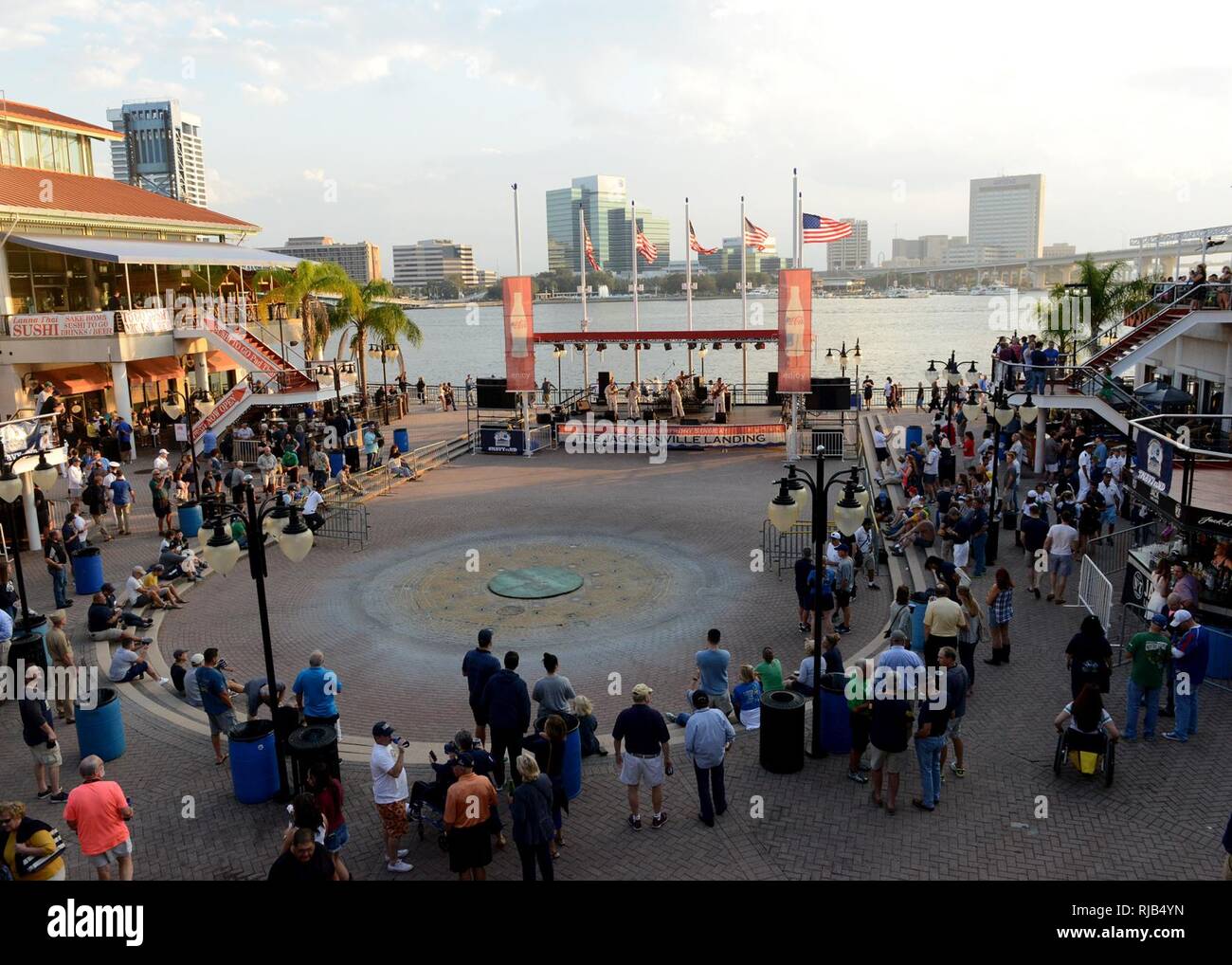 JACKSONVILLE, Fla., (Nov. 4, 2016) The Popular Music Group, assigned to Navy Band Southeast, performs at the Jacksonville Landing  in downtown Jacksonville for a pep rally to kick off the Navy vs. Notre Dame Game weekend.  Navy went on to beat Notre Dame, 28-27. Stock Photo