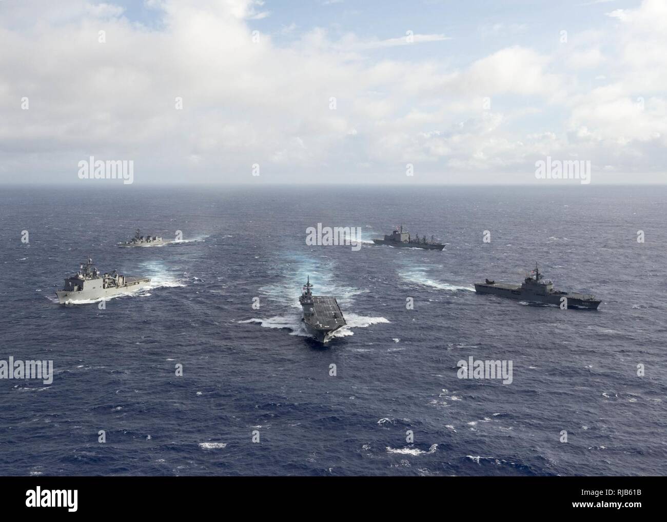 PACIFIC OCEAN (Nov. 6, 2016) - Ships participating in Keen Sword 2017 steam in formation during a photo exercise. Keen Sword 17 is a joint and bilateral field training exercise (FTX) between U.S. and Japanese forces meant to increase readiness and interoperability within the framework of the U.S. – Japan alliance. Stock Photo